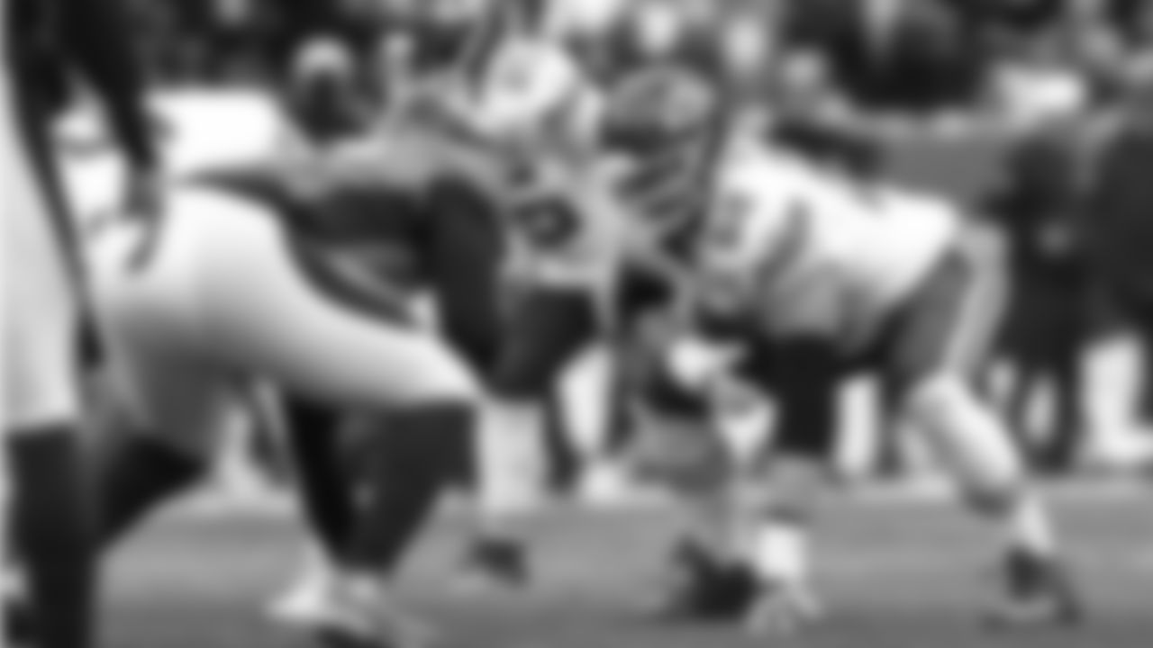 Kansas City Chiefs offensive lineman Joe Thuney (62) in action during the NFL Week 8 matchup against the Denver Broncos at Empower Field at Mile High in Denver, Colorado on October 29, 2023.