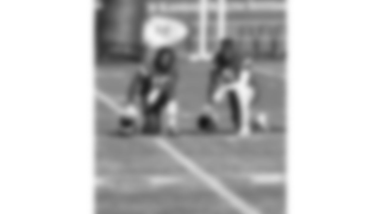 Kansas City Chiefs running back Isiah Pacheco (10) and wide receiver JuJu Smith-Schuster (9) look on from the sideline during practice on Thursday, November 3, 2022.