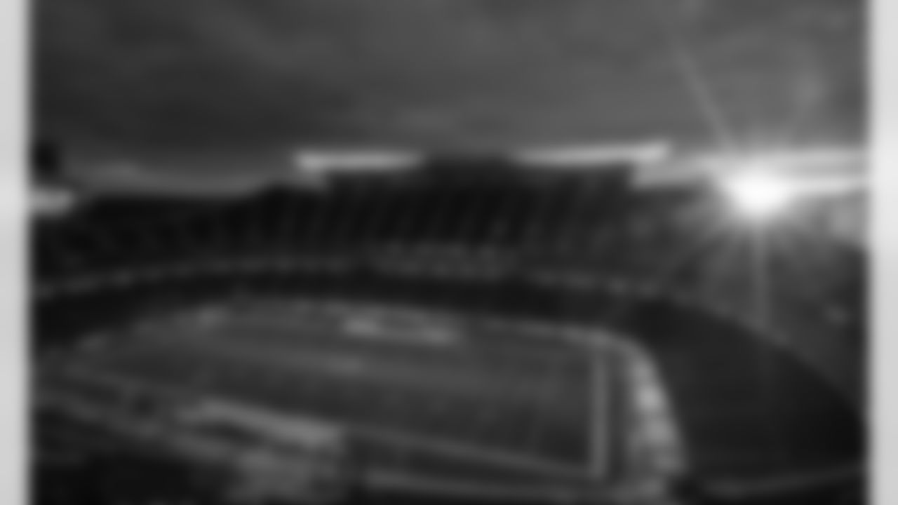 The sun sets on Arrowhead Stadium after an NFL Divisional Round Playoff game, Sunday, Jan. 17, 2021 in Kansas City.