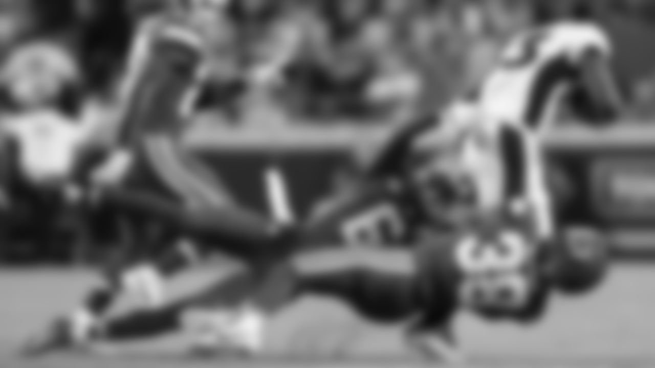 Kansas City Chiefs safety Bryan Cook (6) and cornerback L'Jarius Sneed (38) make a tackle during the week six NFL football game against the Denver Broncos, Thursday, October 12, 2023 in Kansas City.