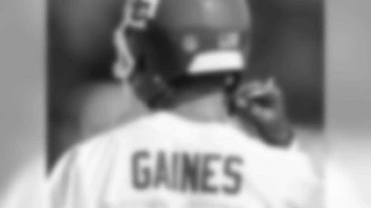 Phillip Gaines strapping his helmet on.