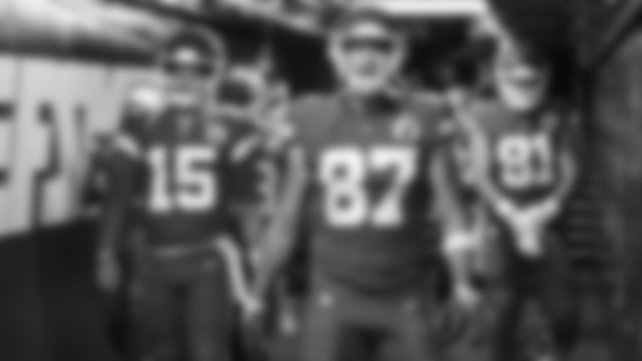 Kansas City Chiefs quarterback Patrick Mahomes (15) and tight end Travis Kelce (87) lead the team out of the tunnel prior to an NFL football game against the Buffalo Bills, Sunday, October 10, 2021 in Kansas City.