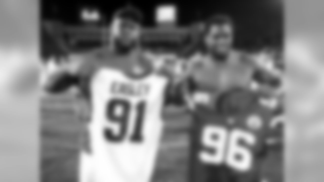 Kansas City Chiefs defensive lineman Jaye Howard (96) and Los Angeles Rams defensive tackle Dominique Easley (91) exchange jerseys after the preseason game at the Los Angeles Memorial Coliseum on Saturday, August 20, 2016.