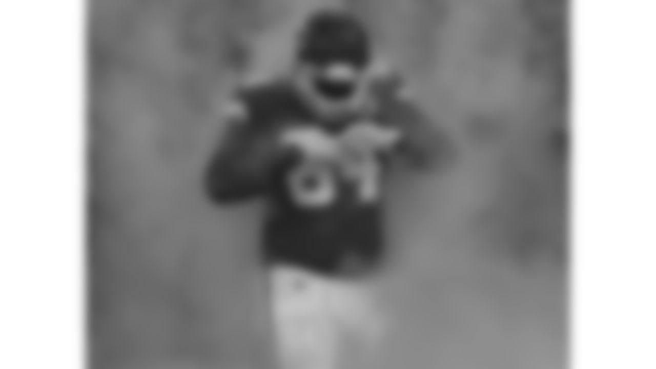 Kansas City Chiefs defensive tackle Mike Pennel (64) emerges from the fog in the tunnel during player introductions prior to an NFL Divisional Round Playoff game, Sunday, Jan. 17, 2021 in Kansas City.