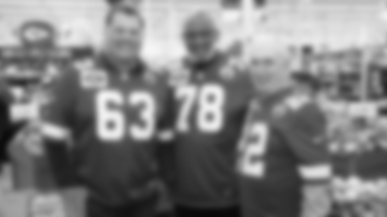 Kansas City Chiefs representatives help with the official kickoff event of the 2021 Playoffs at Hy-Vee on Monday, January 10, 2021 in Lee's Summit.