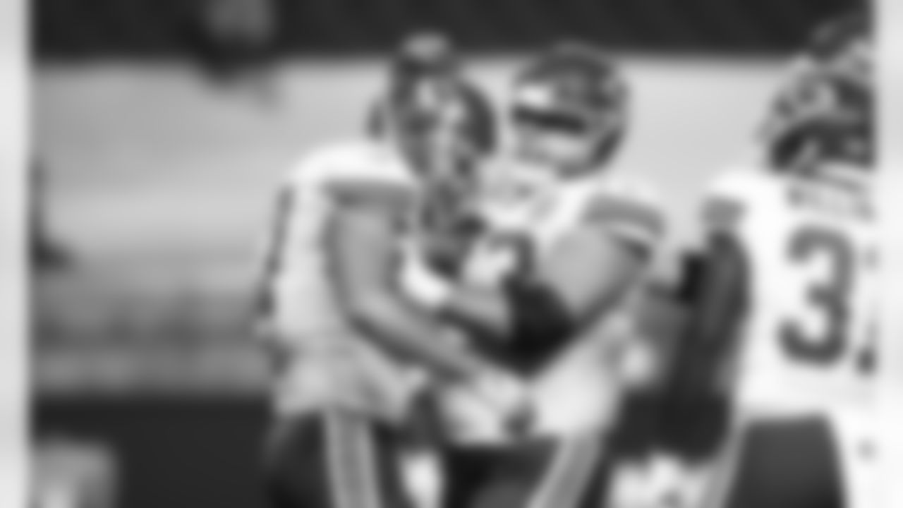 Kansas City Chiefs offensive guard Nick Allegretti (73) and tight end Travis Kelce (87) during an NFL football game against the Las Vegas Raiders at Allegiant Stadium on November 22, 2020