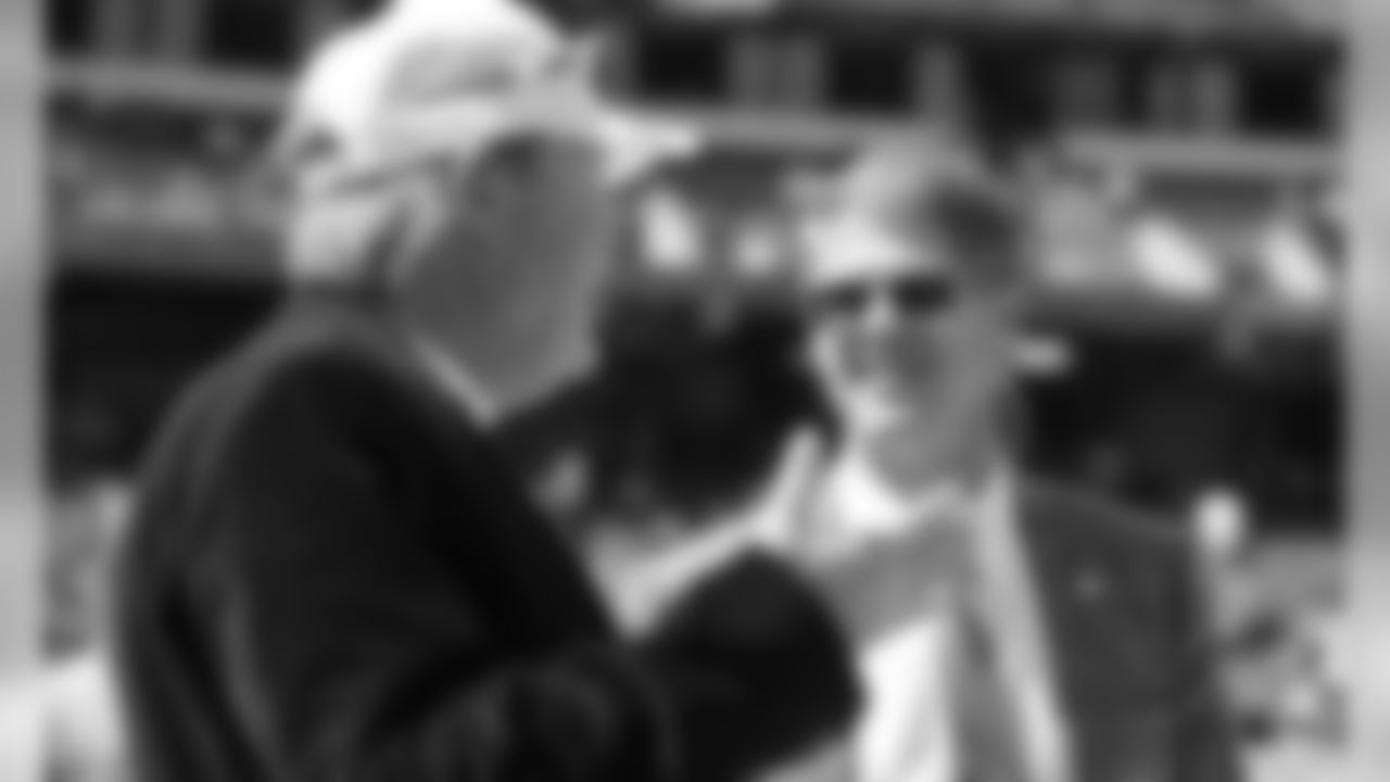 Oakland Raiders Owner Mark Davis and Kansas City Chiefs Chairman, CEO, and Owner Clark Hunt during warmups before the game between the Kansas City Chiefs and the Oakland Raiders at Oakland-Alameda County Coliseum in Oakland, CA.