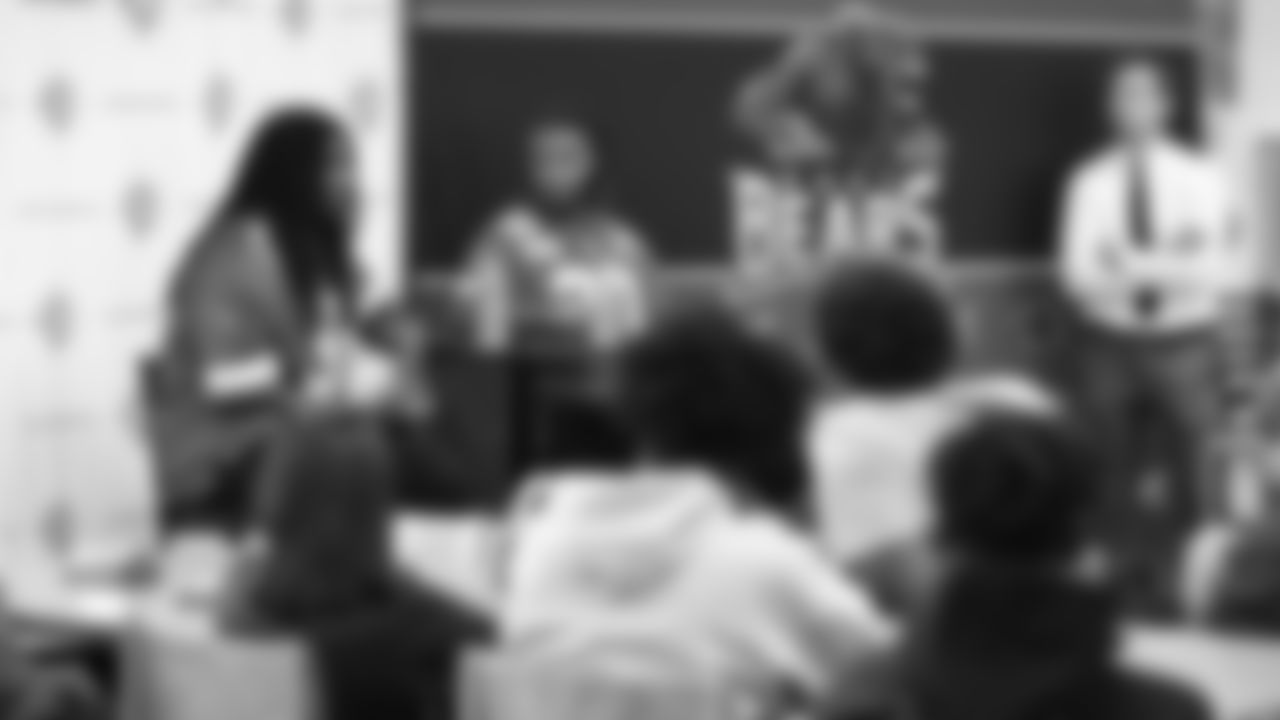 Kansas City Chiefs linebacker Nick Bolton (32) and safety Justin Reid (20) attend a Senior Seminar class at East High School in Kansas City to discuss the importance of continuing education.