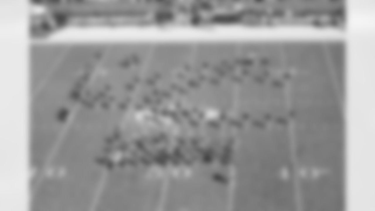 Kansas City Chiefs Cheerleaders and Junior Chiefs Cheerleaders Perform at Halftime during the Chiefs vs Rams game