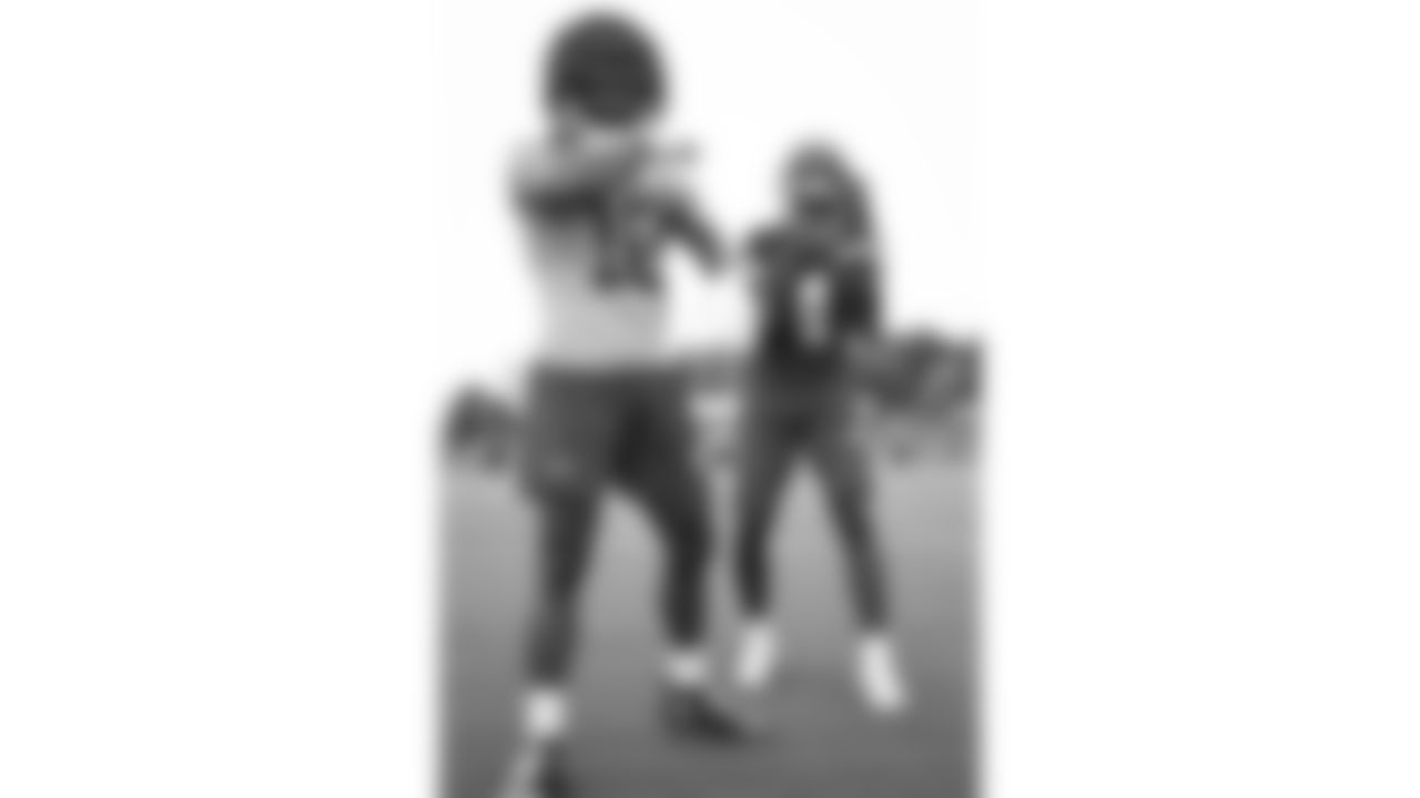 Kansas City Chiefs running back Isiah Pacheco (10) and wide receiver Rashee Rice (4) dance during warm ups at day three of Kansas City Chiefs pre Training Camp in St. Joseph, MO on Friday, July 21, 2023.