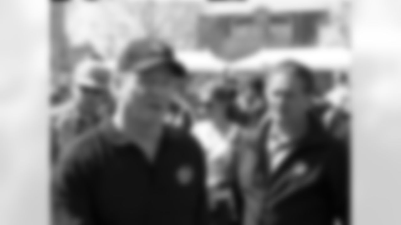 NFL commissioner Roger Goodell looks on with NFL Network Analyst Steve Mariucci during the Play 60 Youth Football Festival at Chelsea Waterside Park in New York City, New York.