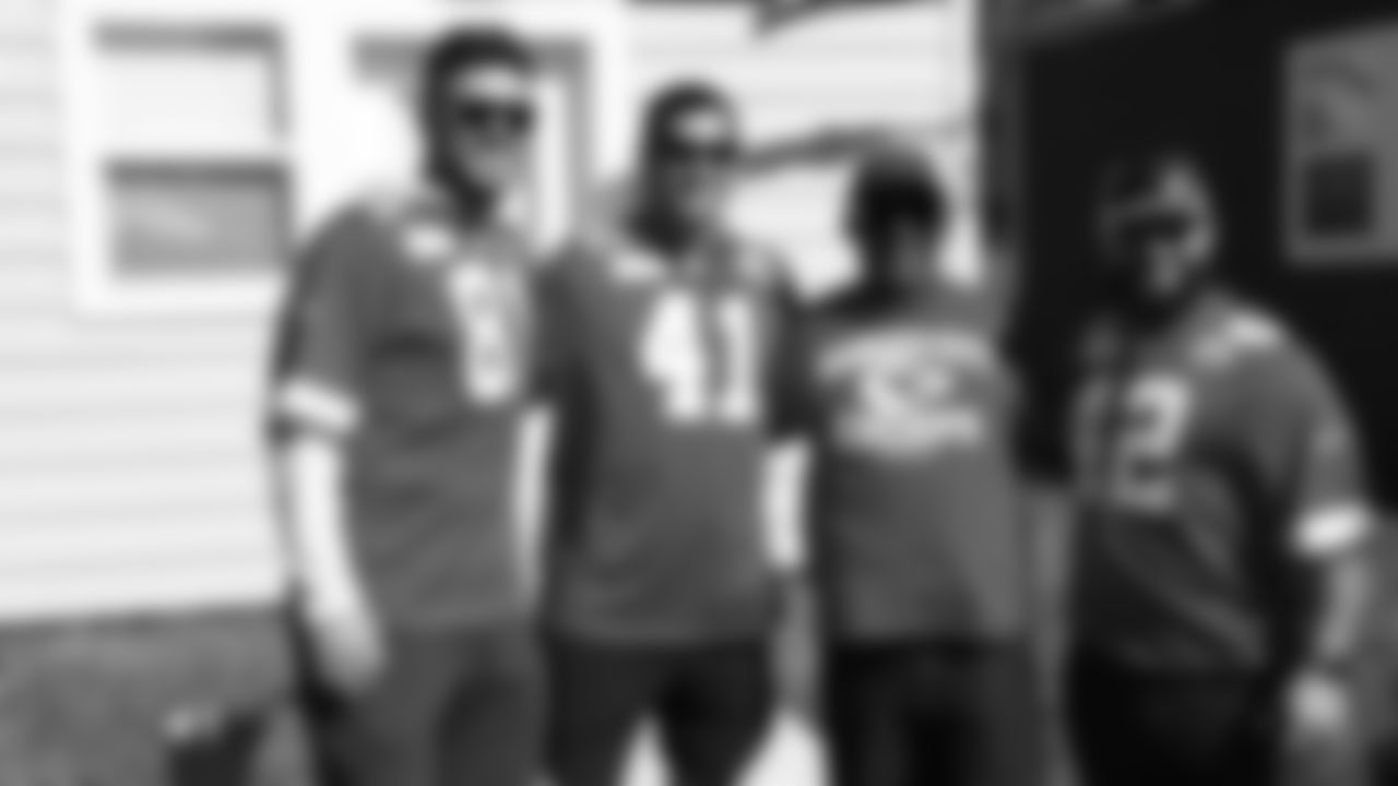 Chiefs players visit the Veterans Community Project to help put finishing touches on homes within the community, followed by a cookout with the residents of VCP. T