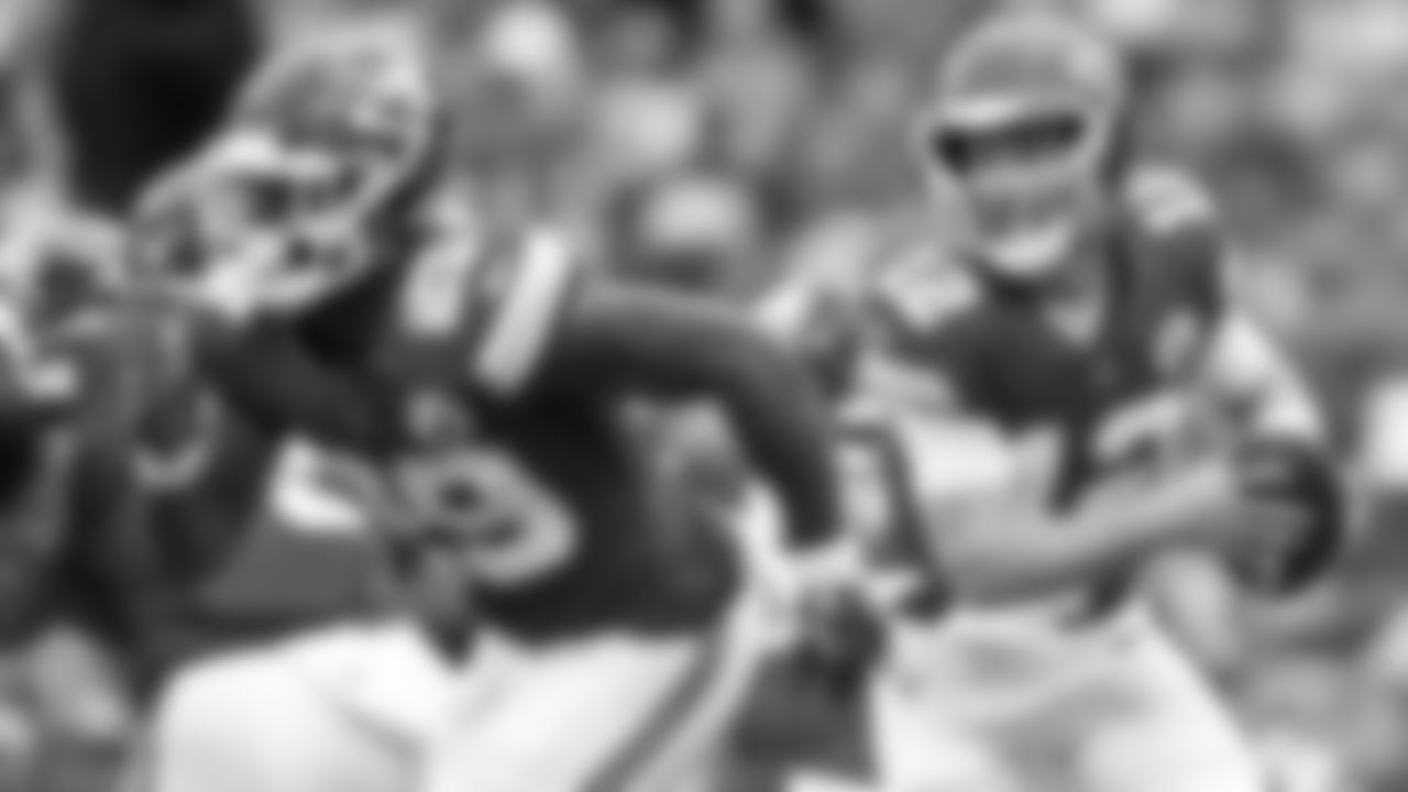 Kansas City Chiefs quarterback Shane Buechele (12) rolls out of the pocket during the Chiefs preseason Week 3 matchup against the Cleveland Browns at GEHA Field at Arrowhead Stadium on Saturday, August 26, 2023.