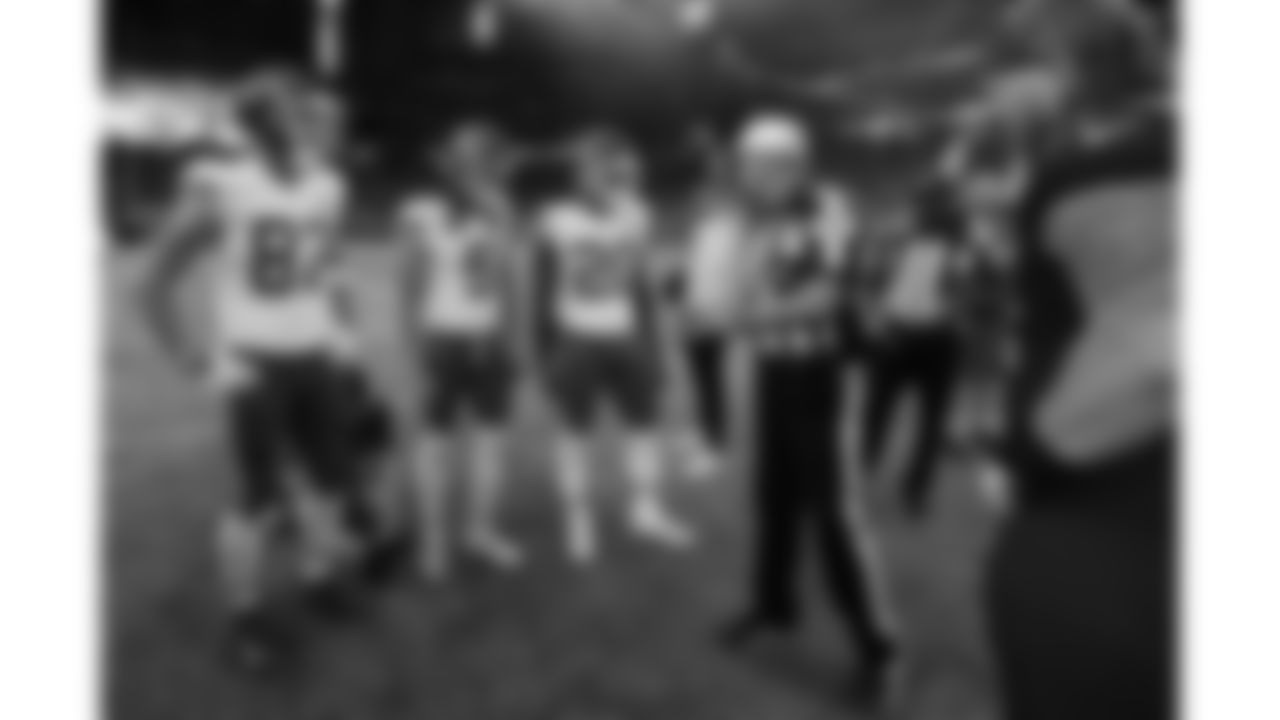 Kansas City Chiefs game captains punter Tommy Townsend (5), safety Justin Reid (20), and tight end Travis Kelce (87) before the Chiefs preseason Week 2 matchup against the Arizona Cardinals on Saturday, August 19, 2023.
