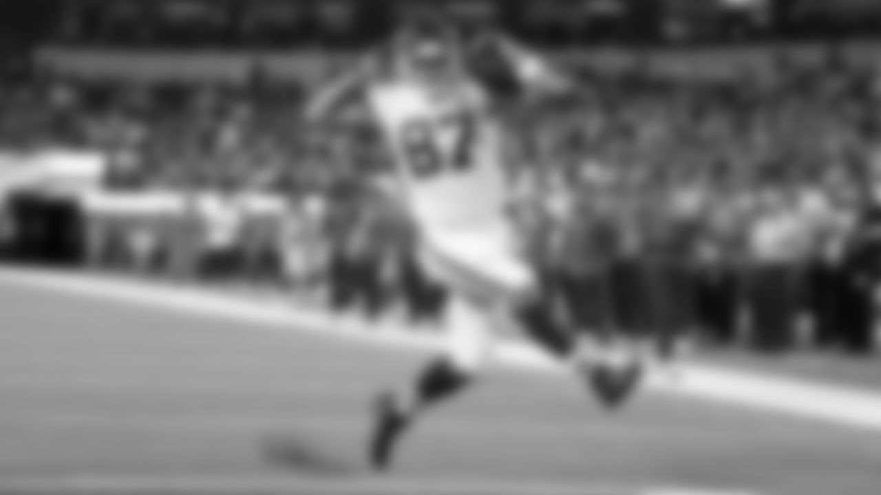 Kansas City Chiefs tight end Travis Kelce (87) celebrates as he runs into the end zone for a touchdown during an NFL football game against the Los Angeles Chargers, Sunday, Nov. 20, 2022, in Inglewood, Calif. Kansas City won 30-27. (Andrew Mather/Kansas City Chiefs via AP)
