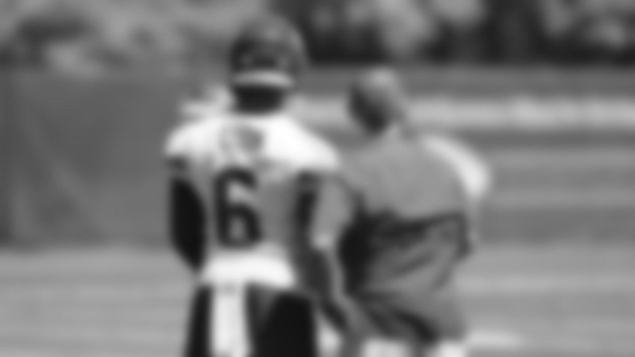 Safety Bryan Cook (6) and Defensive Coordinator Steve Spagnuolo during the first day of practice for Kansas City Chiefs rookie mini camp.