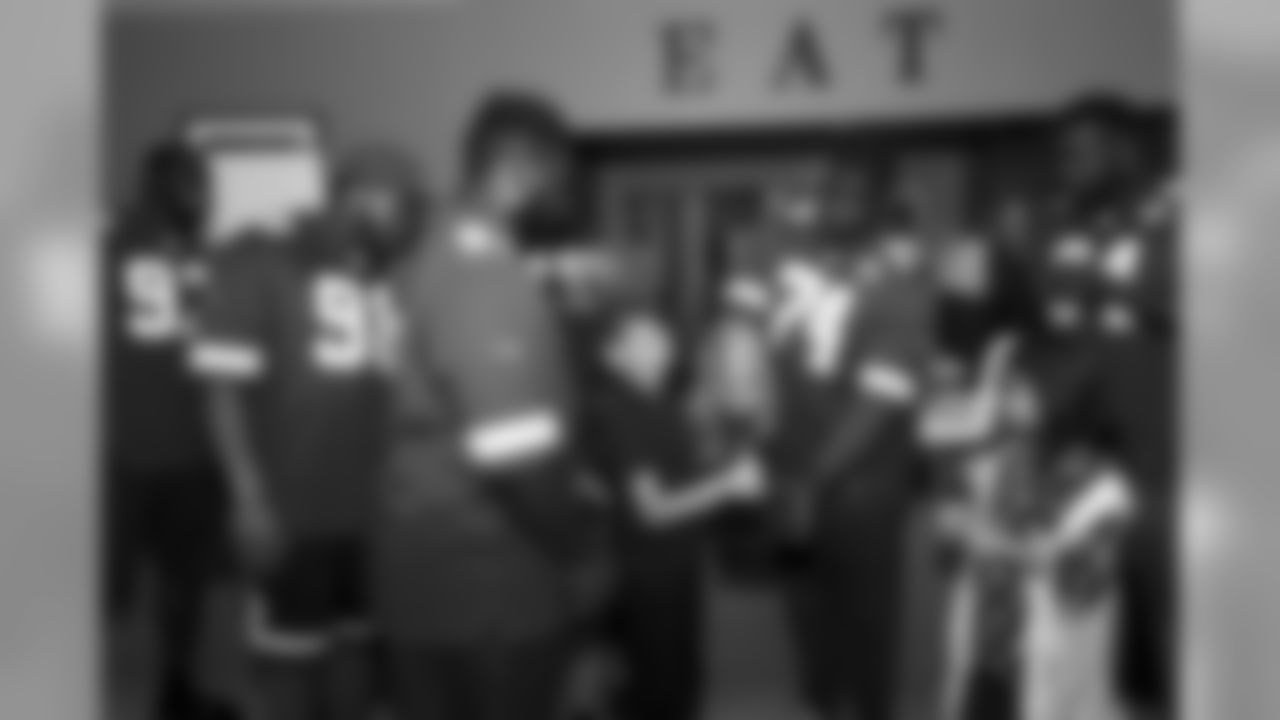 The defensive line visits the Ronald McDonald House
