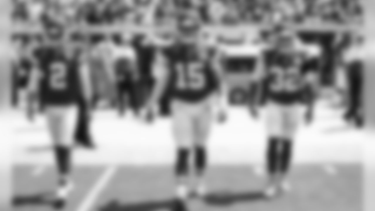 Kansas City Chiefs Punter Dustin Colquitt (2), Quarterback Patrick Mahomes (15), and Safety Tyrann Mathieu (32) before the game between the Kansas City Chiefs and the Jacksonville Jaguars at TIAA Bank Field in Jacksonville, FL.