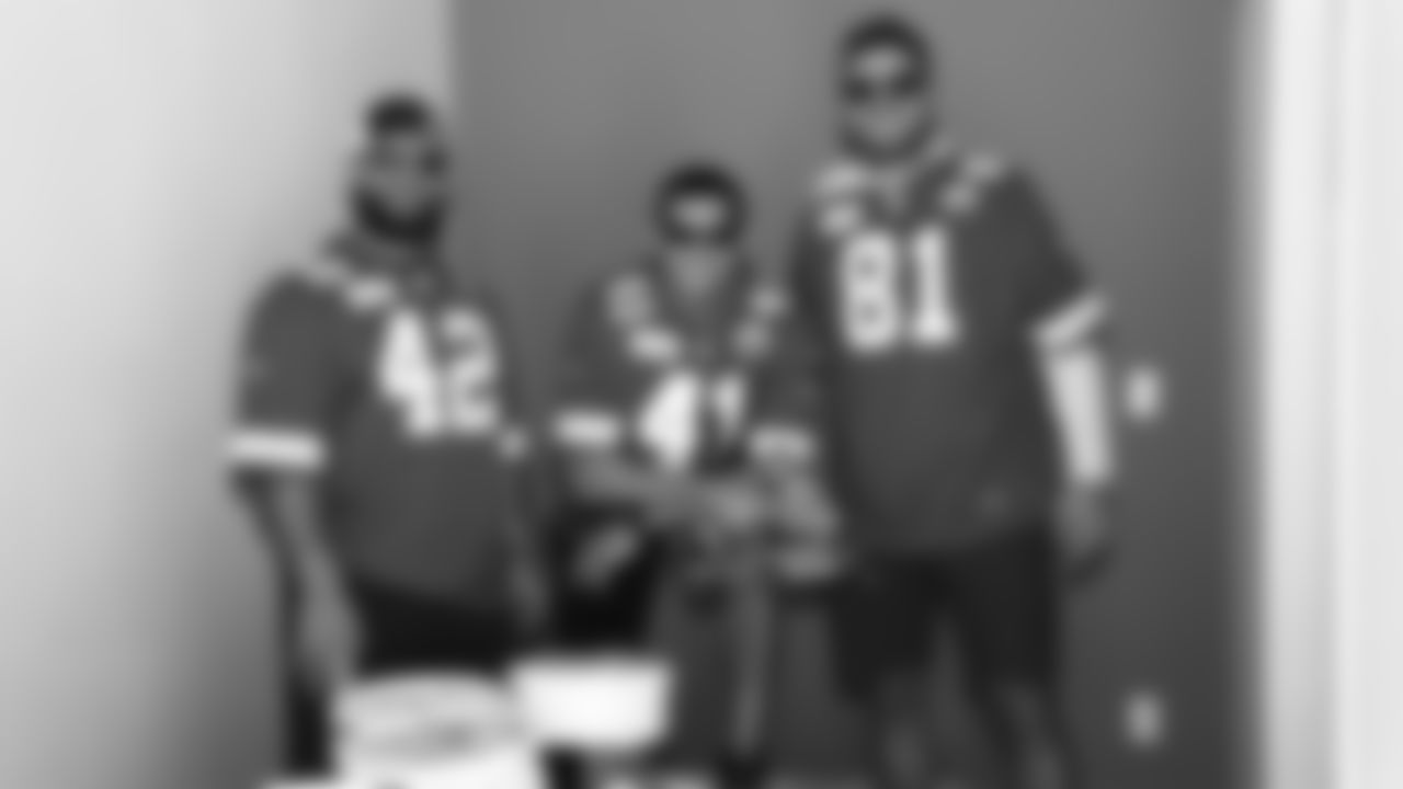 Chiefs players visit the Veterans Community Project to help put finishing touches on homes within the community, followed by a cookout with the residents of VCP. T