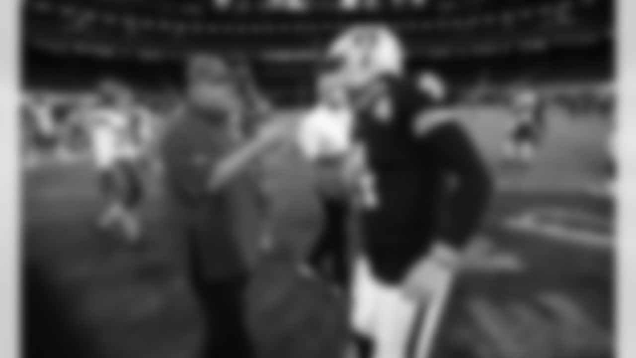 Kansas City Chiefs head coach Andy Reid and quarterback Derek Carr (4) during an NFL football game against the Las Vegas Raiders at Allegiant Stadium on November 22, 2020
