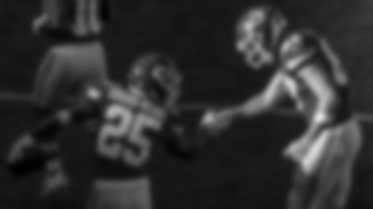 Kansas City Chiefs running back Clyde Edwards-Helaire (25) and Kansas City Chiefs tight end Travis Kelce (87) during an NFL football game against the Las Vegas Raiders, Sunday, December 12, 2021 in Kansas City.