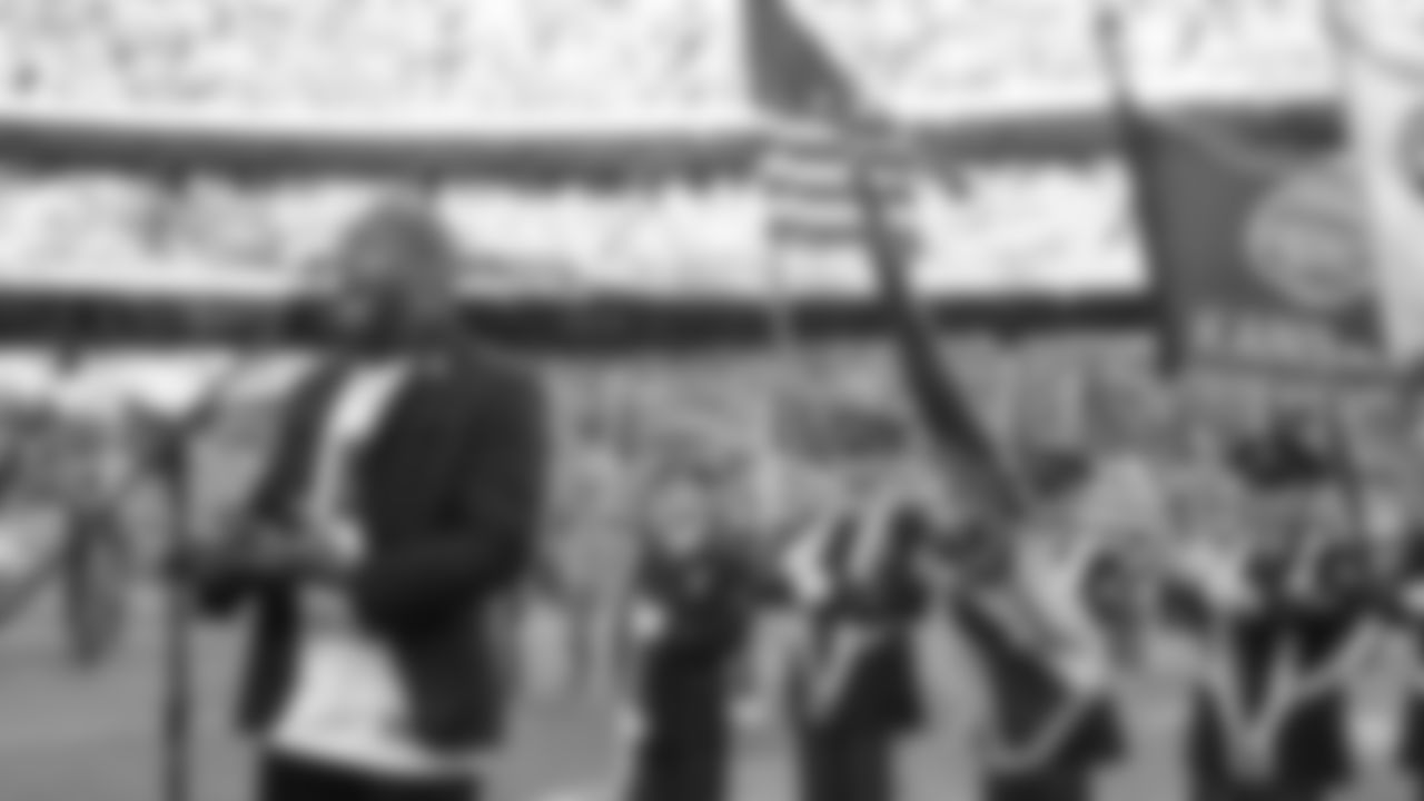 U.S. Navy Master Sergeant Robert Carter singing the National Anthem prior to an NFL football game against the Dallas Cowboys, Sunday, November 21, 2021 in Kansas City.