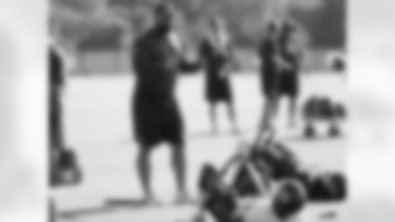 Kansas City Chiefs strength and conditioning assistant Travis Crittenden instructs players during stretching at practice on the third day of training camp on Mosaic Life Care Field at the campus of Missouri Western State University on Friday, July 29, 2016.