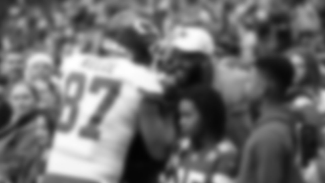 Derrick Johnson and Kansas City Chiefs tight end Travis Kelce (87) prior to an NFL football game against the Houston Texans, Sunday, December 18, 2022 in Houston.