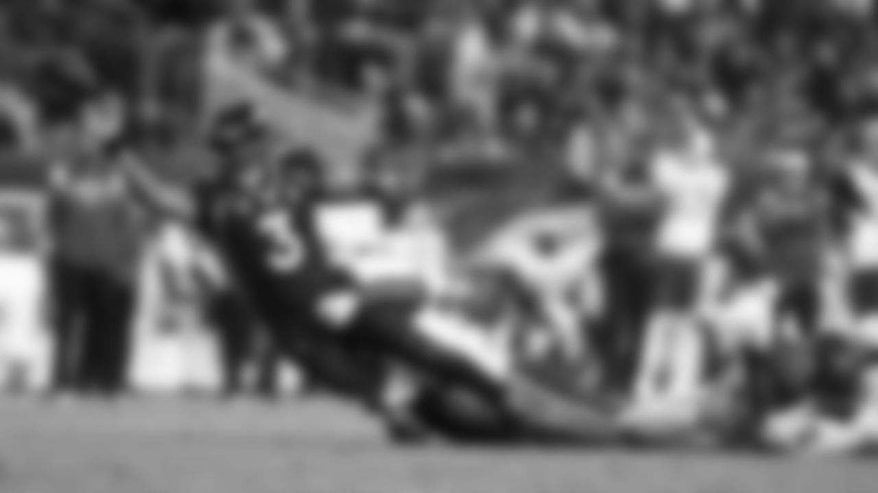 Quarterback Russel Wilson (3) gets the ball away to avoid a sack during an NFL football game against the Denver Broncos, Sunday December 11, 2022