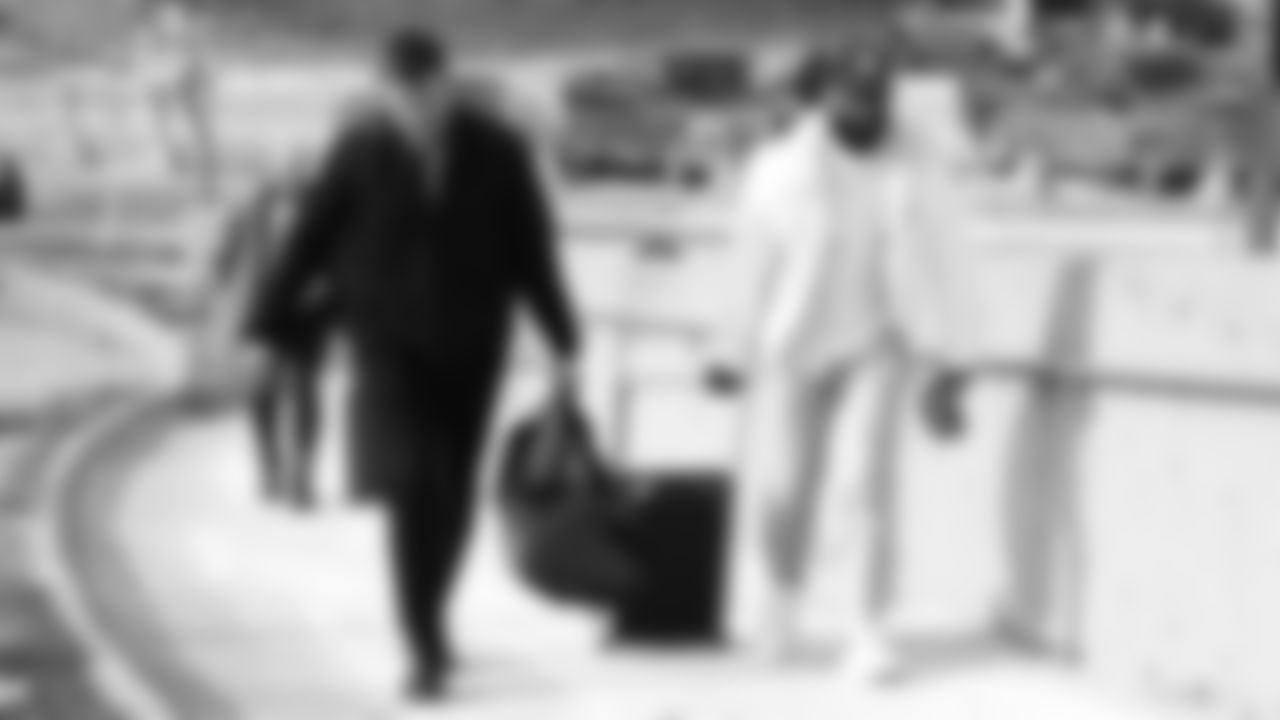 Kansas City Chiefs linebacker Ben Niemann (56) and inside linebacker Anthony Hitchens (53) arrive at the Kansas City International Airport to travel to Denver for week eighteen against the Denver Broncos.