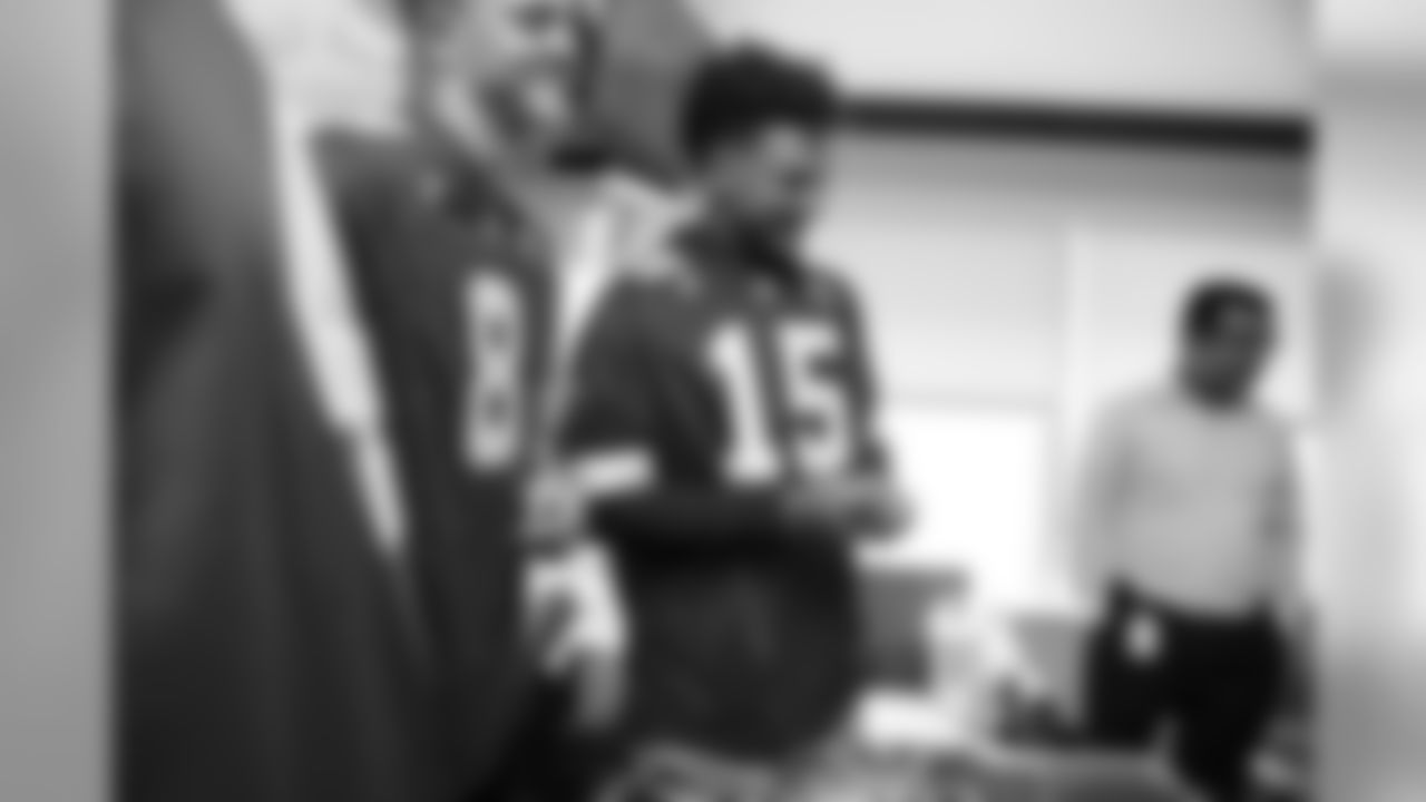 The Chiefs Community Caring Team, led by the Chiefs quarterbacks, visit The University of Kansas Health System to share hope and sign autographs for those fighting medical battles, including those in the oncology unit.
