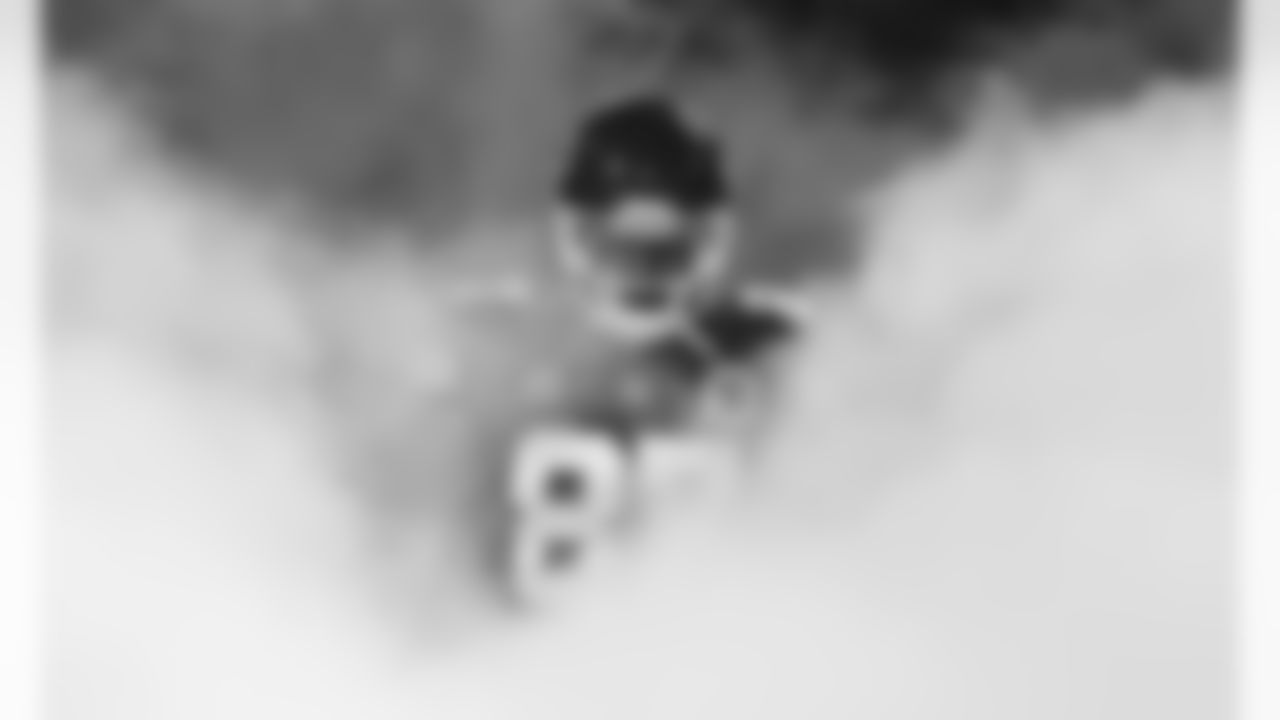 Kansas City Chiefs tight end Travis Kelce (87) emerges from the smoke during player introductions prior to the AFC Championship football game, Sunday, Jan. 24, 2021 in Kansas City.