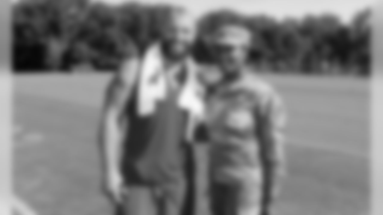 Kansas City Chiefs Fullback Anthony Sherman (42) poses with a fan after a 2019 Training Camp practice at Missouri Western State University in St. Joseph, MO.