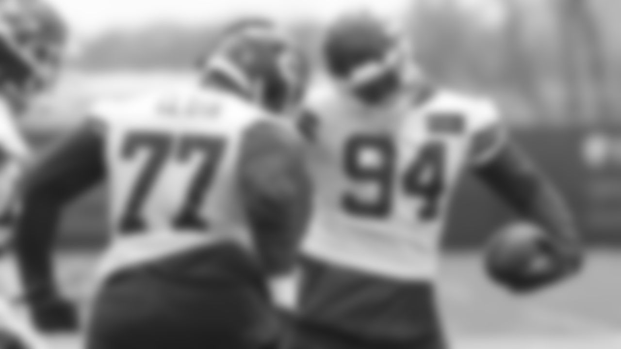 Defensive tackle Christian Clark (77) and defensive end Malik Herring (94) during the second day of practice for Kansas City Chiefs rookie mini camp.