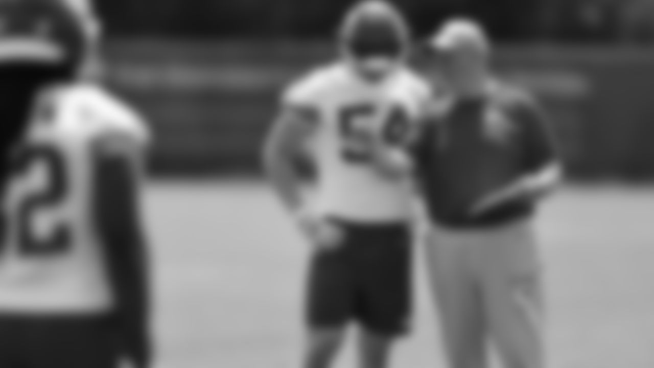 Kansas City Chiefs linebacker Leo Chenal (54) and Kansas City Chiefs Outside Linebackers Coach Ken Flajole at day 3 of OTAs on Wednesday, May 24th, 2023 in Kansas City Missouri.