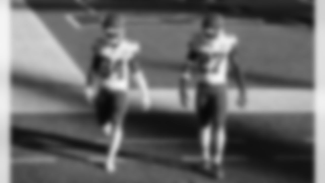 Kansas City Chiefs running back Darwin Thompson (34) and cornerback Rashad Fenton (27) prior to an NFL football game against the Tampa Bay Buccaneers at Raymond James Stadium on November 29, 2020.