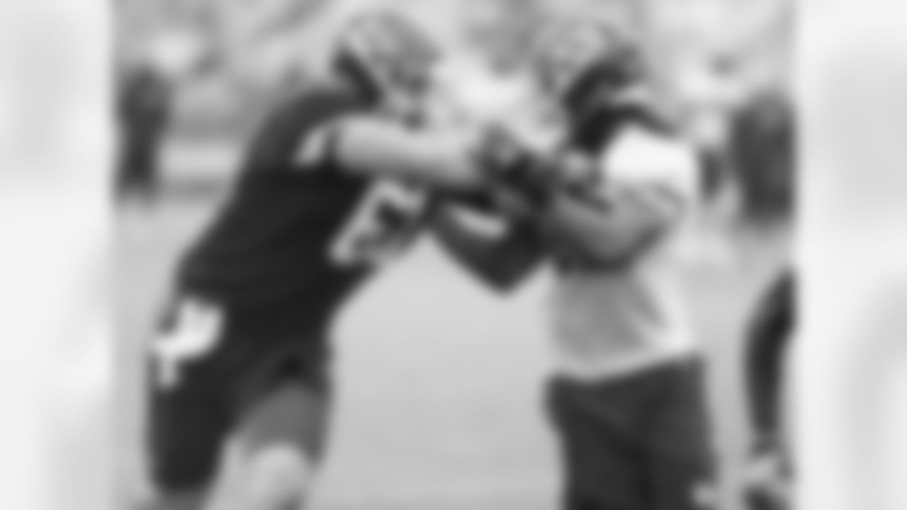 Kansas City Chiefs offensive lineman Mitch Morse (61) blocks linebacker Terrance Smith (62) at practice on the fifth day of training camp on Mosaic Life Care Field at the campus of Missouri Western State University on Wednesday, August 3, 2016.