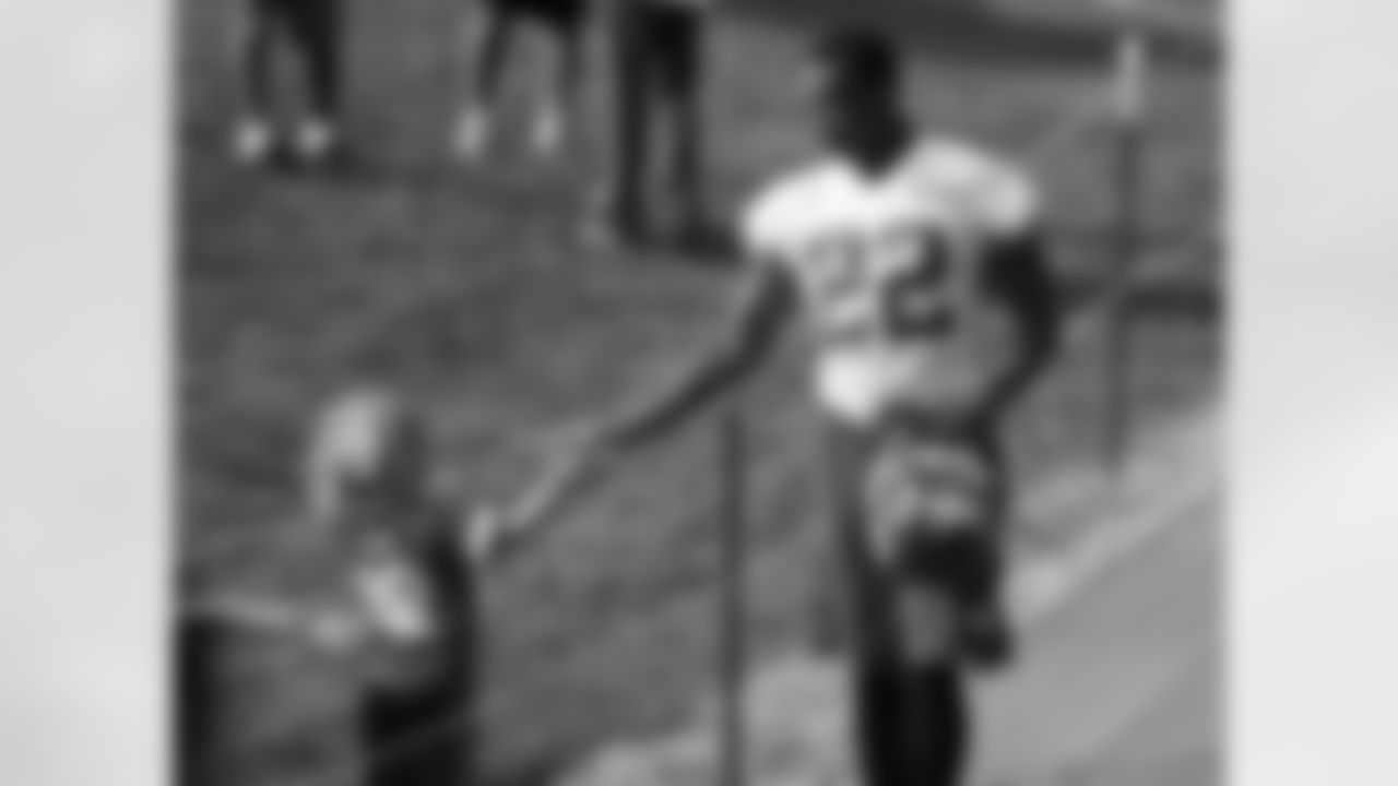 Kansas City Chiefs defensive back Marcus Peters (22) high fives a fan before practice on the ninth day of training camp on Mosaic Life Care Field at the campus of Missouri Western State University on Monday, August 8, 2016.