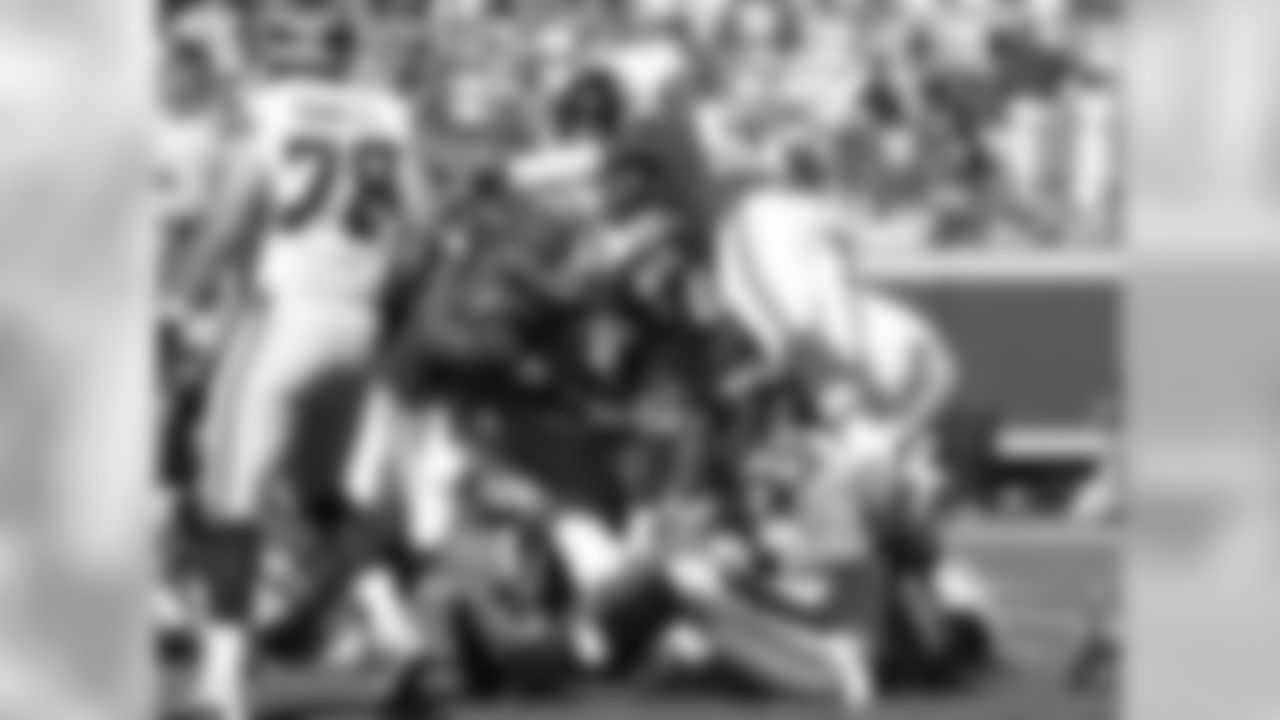 Seattle Seahawks running back George Farmer (41) is tackled by Kansas City Chiefs linebacker Andy Mulumba (40) during the first half of the preseason game at Arrowhead Stadium on Saturday, August 13, 2016.