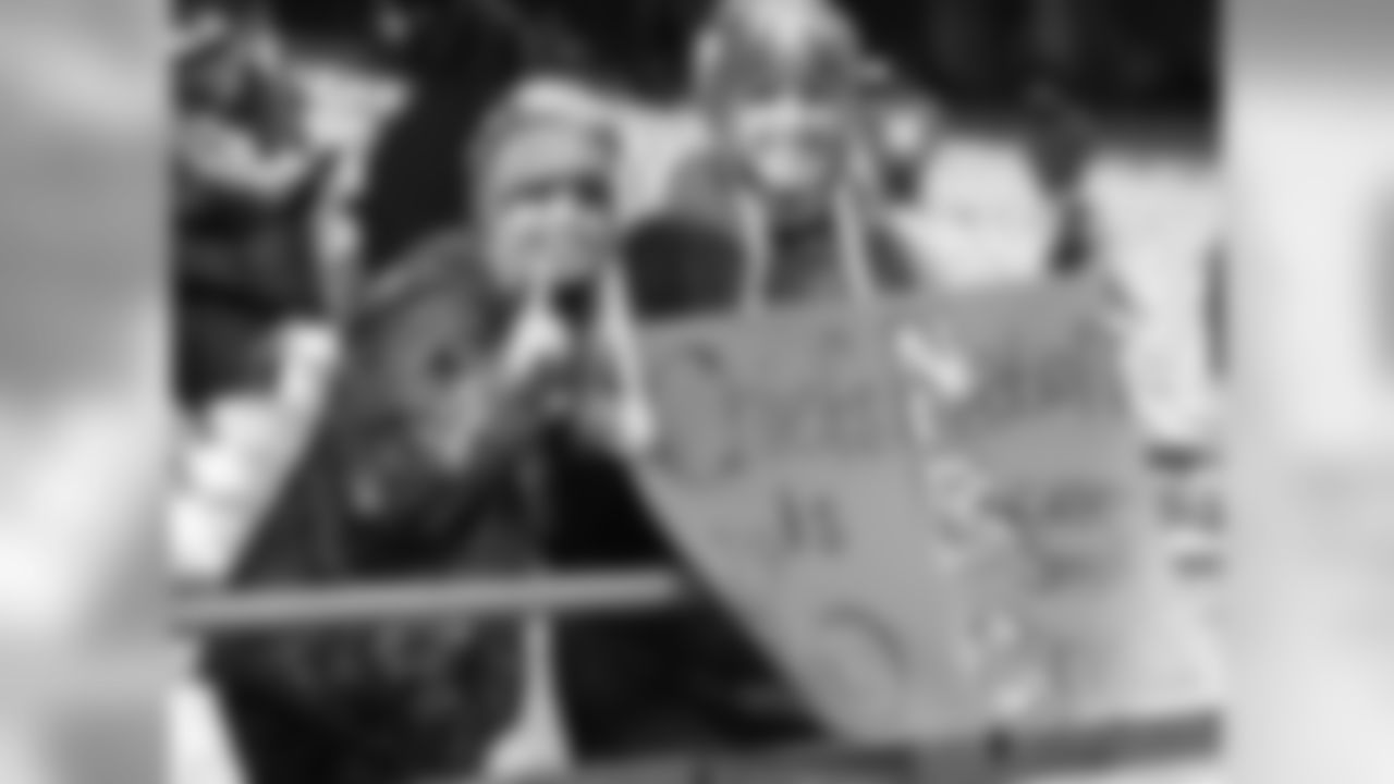 Photos of fans and players showing their support for Safety, Eric Berry