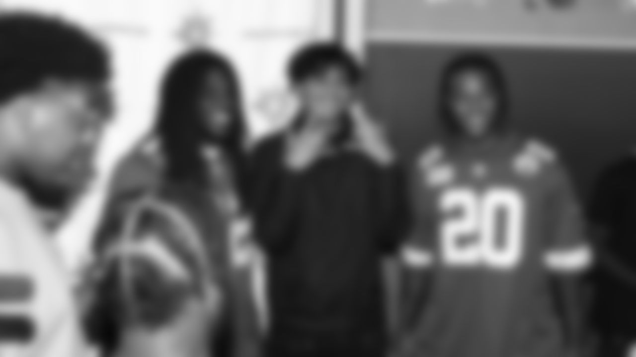 Kansas City Chiefs linebacker Nick Bolton (32) and safety Justin Reid (20) attend a Senior Seminar class at East High School in Kansas City to discuss the importance of continuing education.