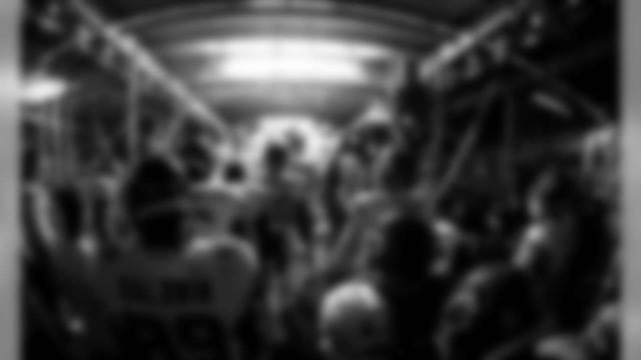 Kansas City Chiefs players wait to enter the field before a 2012 away game.
