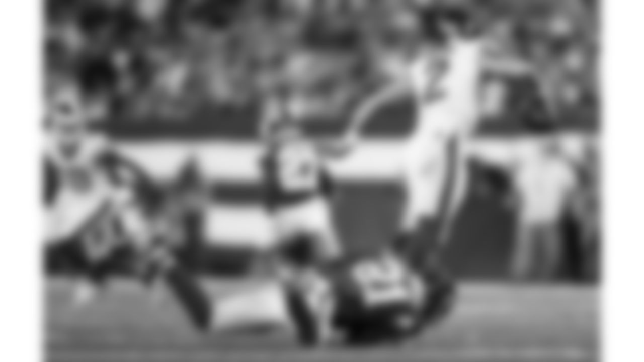 Kansas City Chiefs safety Mike Edwards (21) sacks New York Jets quarterback Zach Wilson during the regular season Week 4 NFL Football Game on Sunday, October 1, 2023 at MetLife Stadium in East Rutherford, NJ.