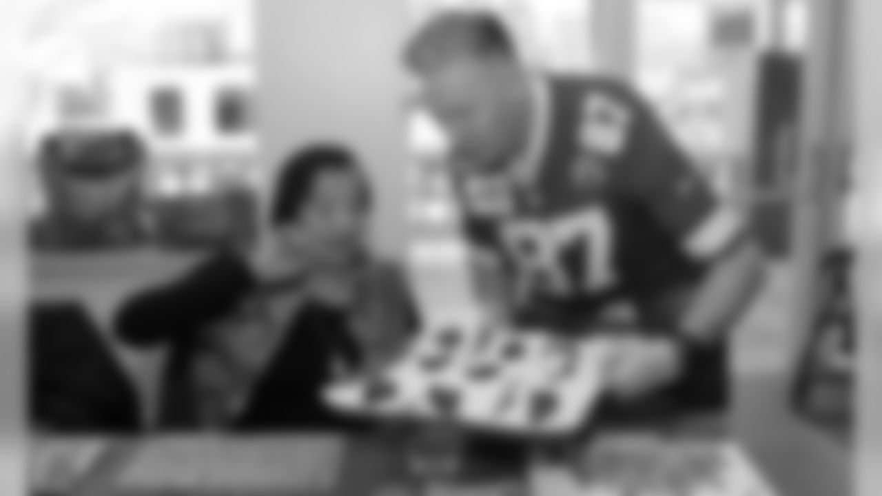 The Chiefs Ambassadors visit the Don Bosco Senior Center to ring in the New Year, play bingo, and engage with the seniors living there, many of whom are life-long Chiefs fans.