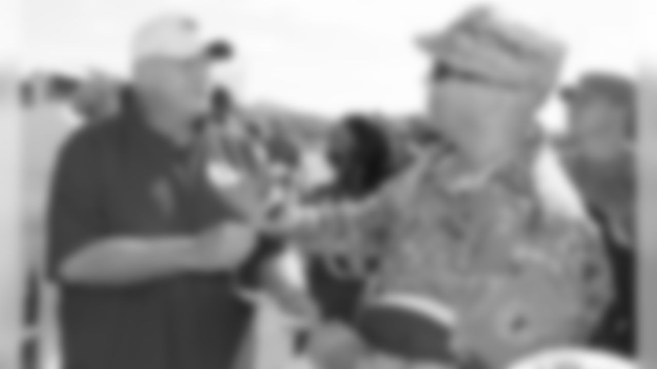 Kansas City Chiefs Head Coach Andy Reid signs autographs for fans after a 2019 Training Camp practice at Missouri Western State University in St. Joseph, MO.