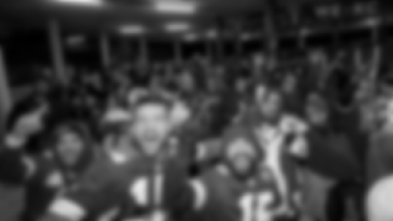 Kansas City Chiefs Fans celebrating while leaving the seats after the divisional playoff game against the Buffalo Bills, Kansas City, MO on January 23, 2022