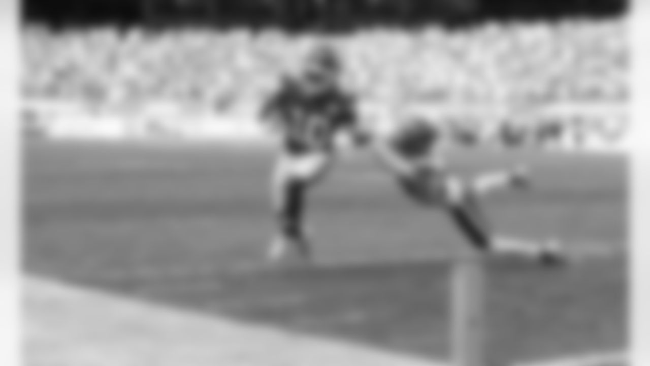 Kansas City Chiefs Wide Receiver Tyreek Hill (10) runs with the ball after a catch during an NFL Divisional Round Playoff game against the Cleveland Browns, Sunday, January 17, 2021 in Kansas City.