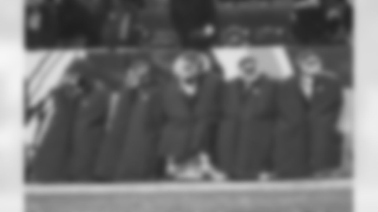 Players trying to stay warm on the sideline