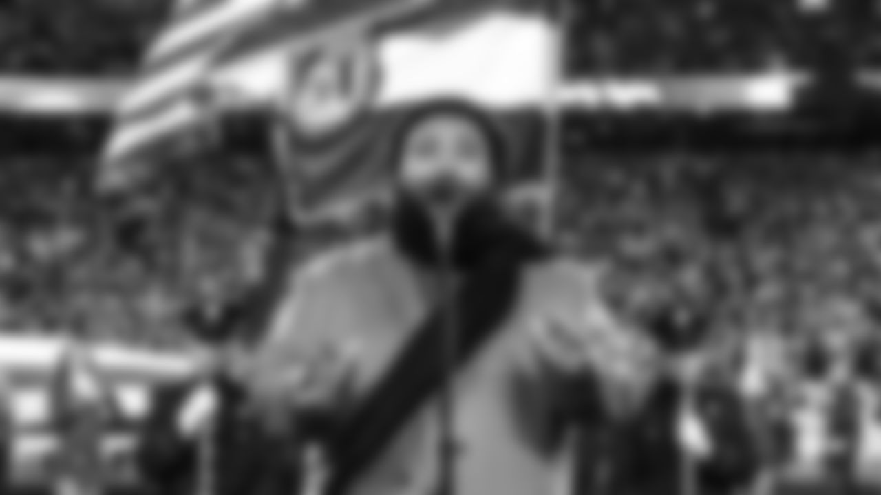 Matthew Johnson sings the National Anthem prior to an NFL football game against the Denver Broncos, Sunday, December 5, 2021 in Kansas City.