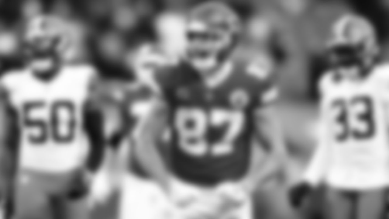 Kansas City Chiefs Tight End Travis Kelce (87) celebrates a first down during an NFL Divisional Round Playoff game, Sunday, Jan. 17, 2021 in Kansas City.